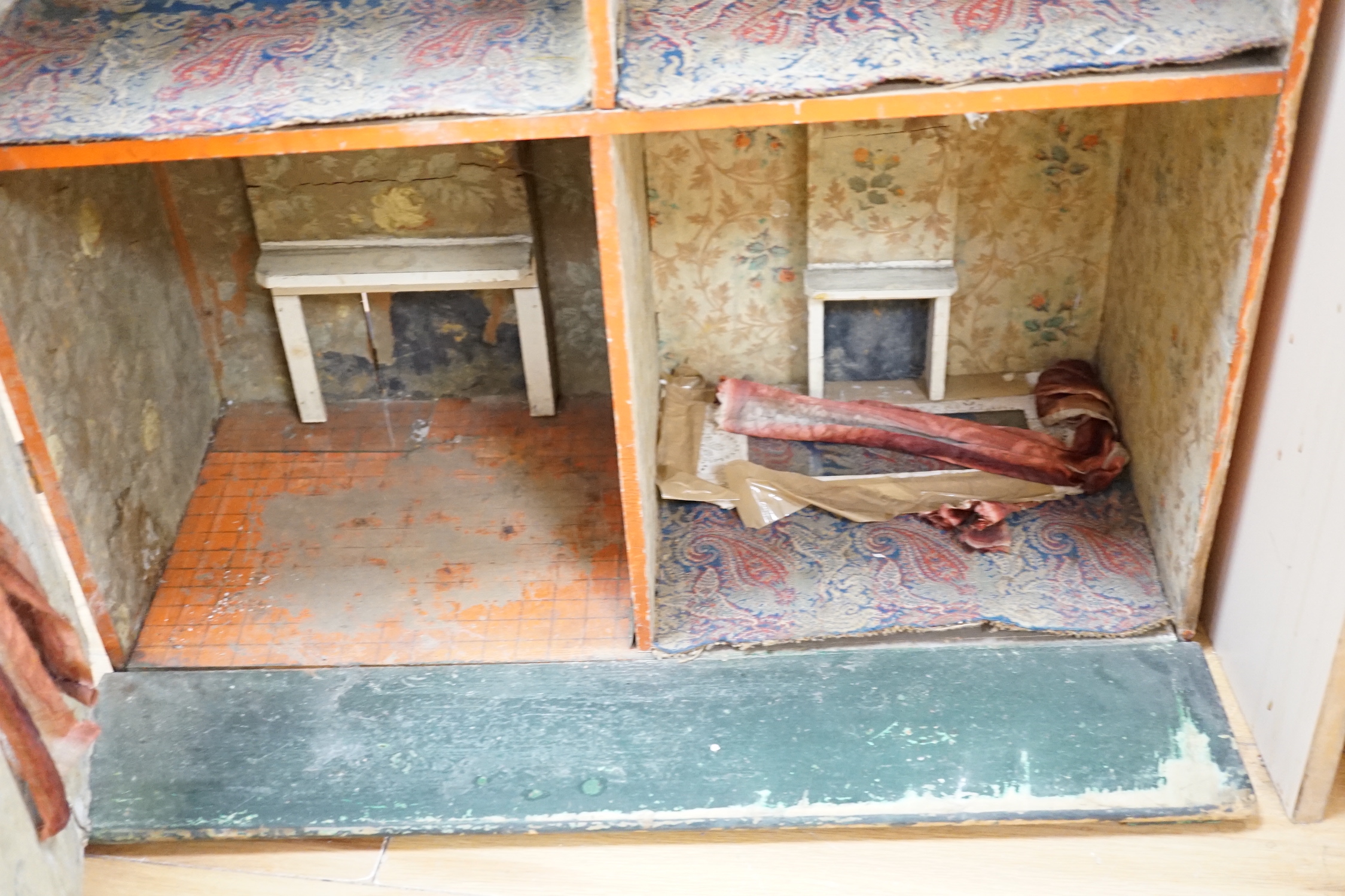 A 19th century doll's house, box back, attributed to Silber and Fleming